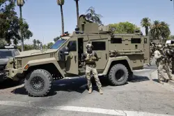 Arellano: In an L.A. park, Trump unleashed his latest show of farce: The Battle of the Photo Op